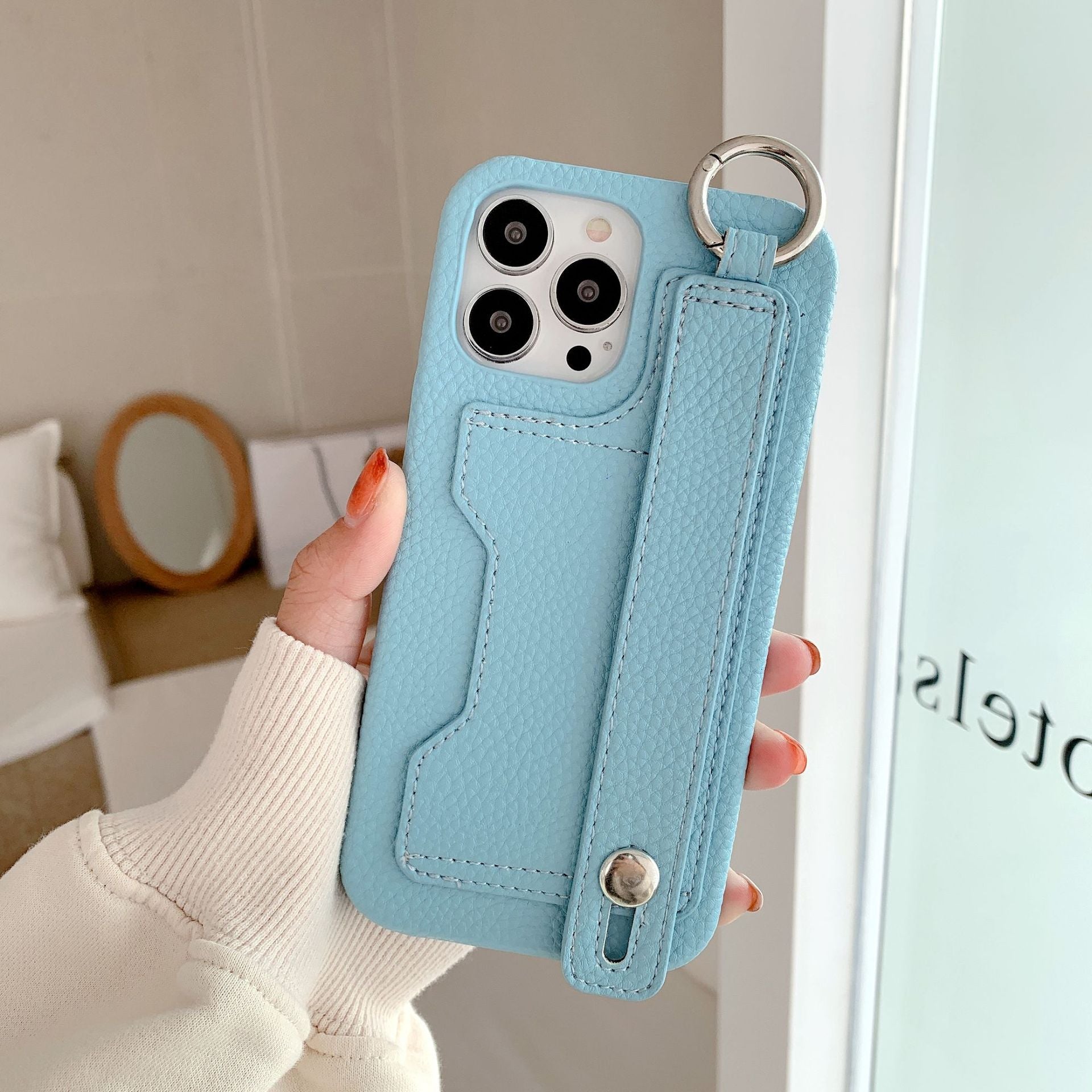 Leather phone case suitable for iPhone, with card slot and wrist strap protection